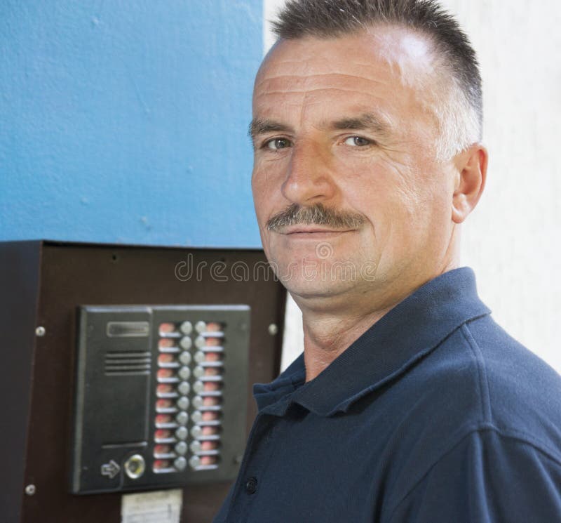 Man and intercom stock photo