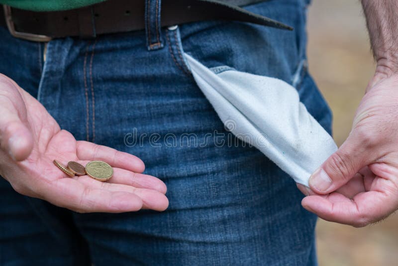 Man in jeans with empty pocket