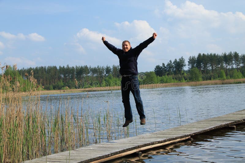 Man juming on pier royalty free stock images