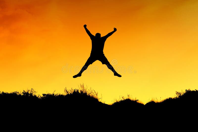 A Man Jump on the Top of Mountain Stock Photo Image of jump, mountain