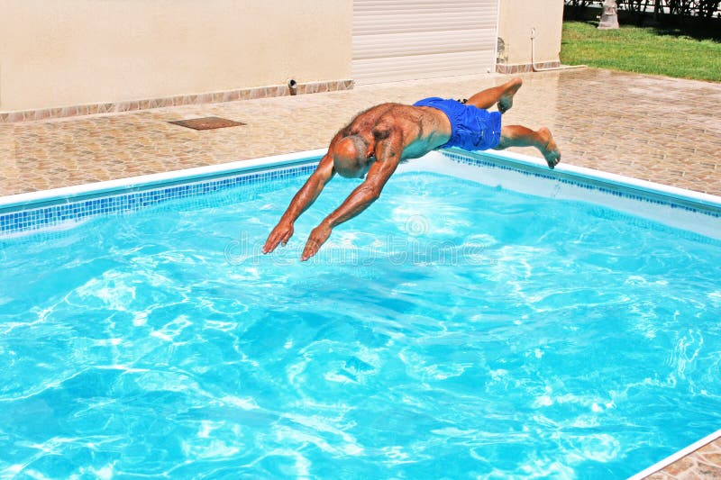 Man jumping to swimming pool.