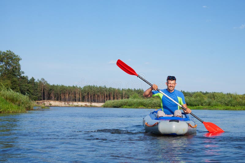 Summer vacation - Young man kayaking on the river. Adventurer adventure stock images, royalty-free photos and pictures