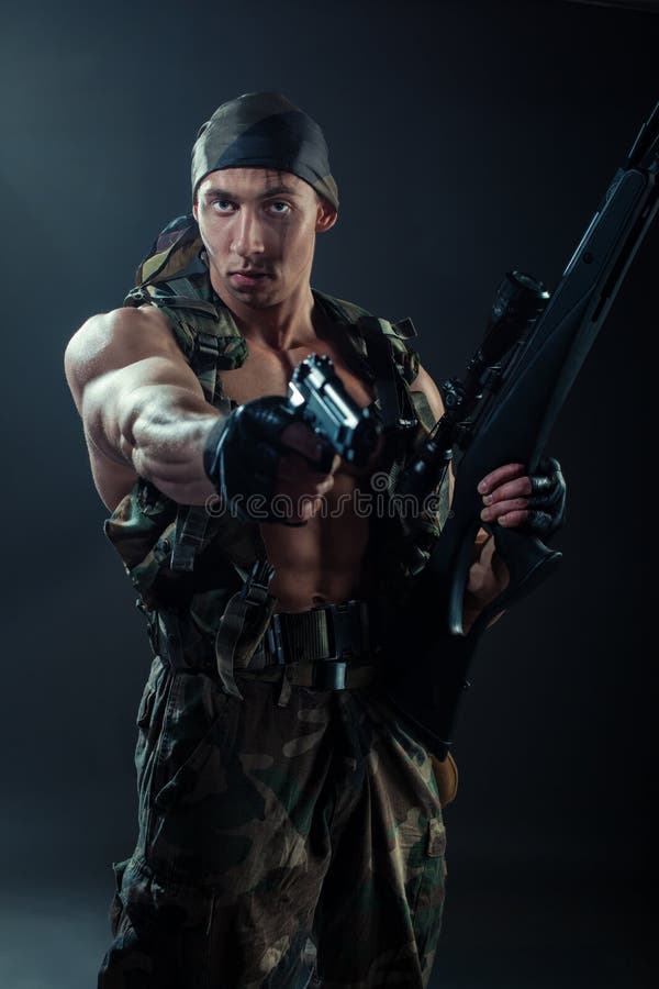 Strong Man Muscles Gun Stock Photos Free & RoyaltyFree Stock Photos from Dreamstime