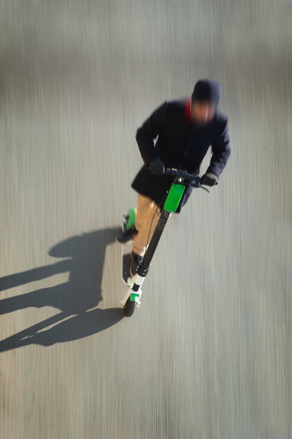 Man on kick scooter stock image. Image of scooter, motion 152229641