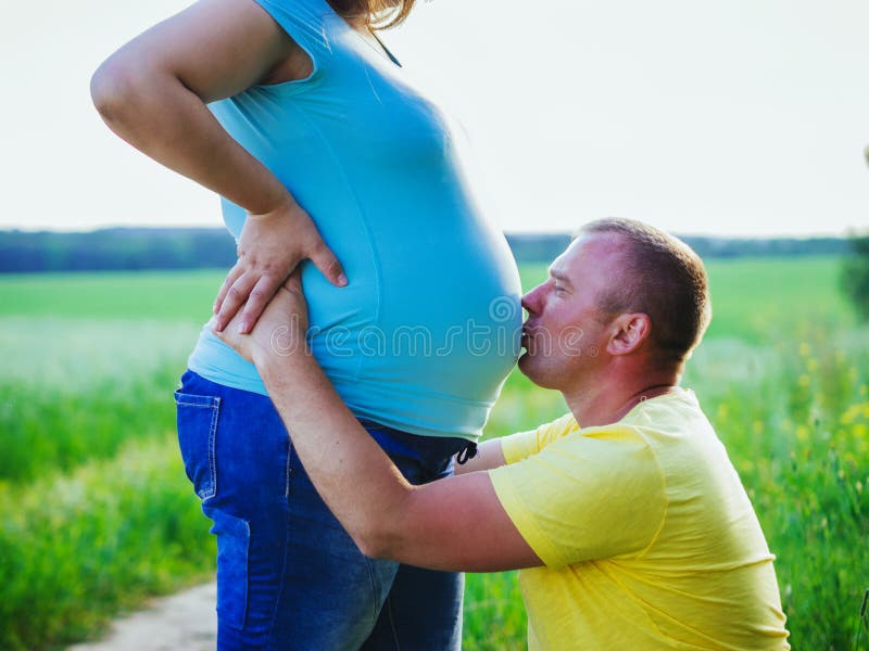 Outdoor couple belly wife