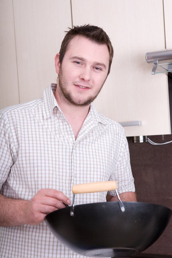 Man in kitchen