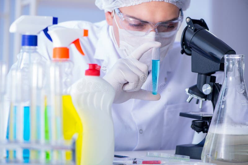 The Man in the Lab Testing New Cleaning Solution Detergent Stock Photo