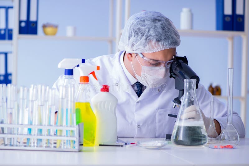 The Man in the Lab Testing New Cleaning Solution Detergent Stock Photo