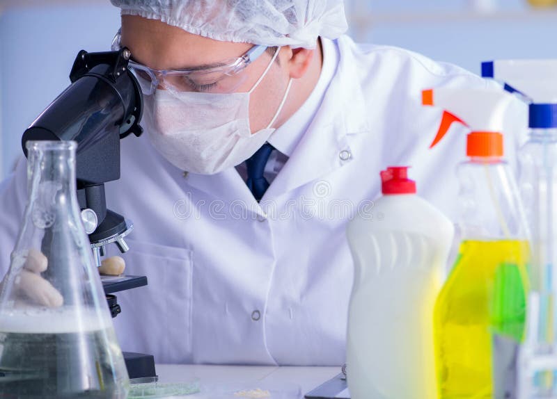 The Man in the Lab Testing New Cleaning Solution Detergent Stock Photo