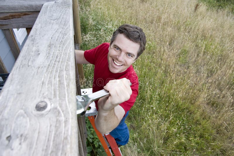 Man on Ladder - Horizontal