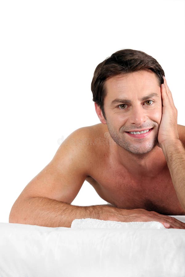 Man laid on massage table stock photo. Image of laid - 22449330