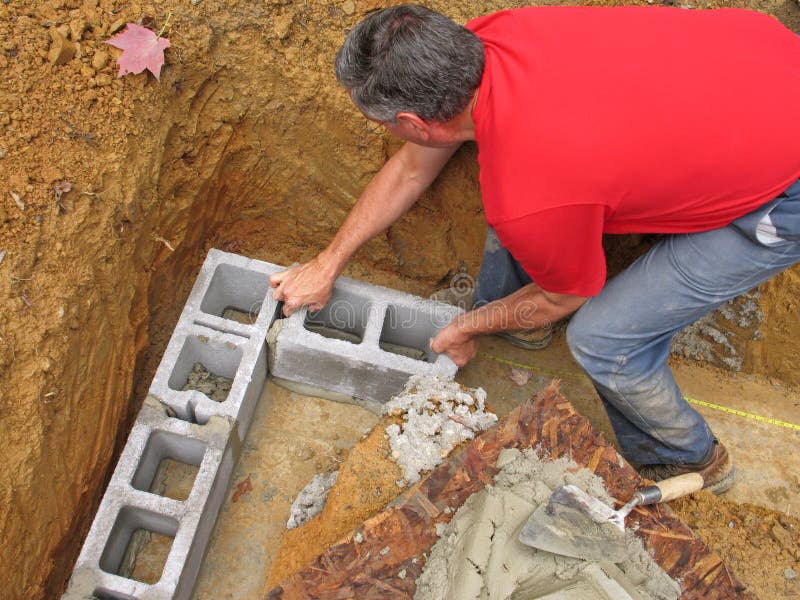 Man Laying Concrete Block Wall Stock Photo - Image of worker