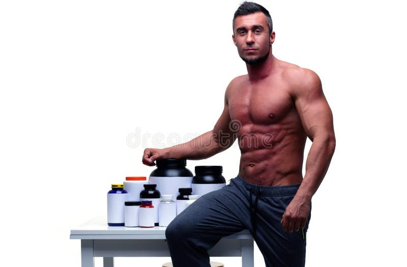 Man leaning on the table with sports nutrition royalty free stock photos Man leaning on the table with sports nutrition royalty free stock photos