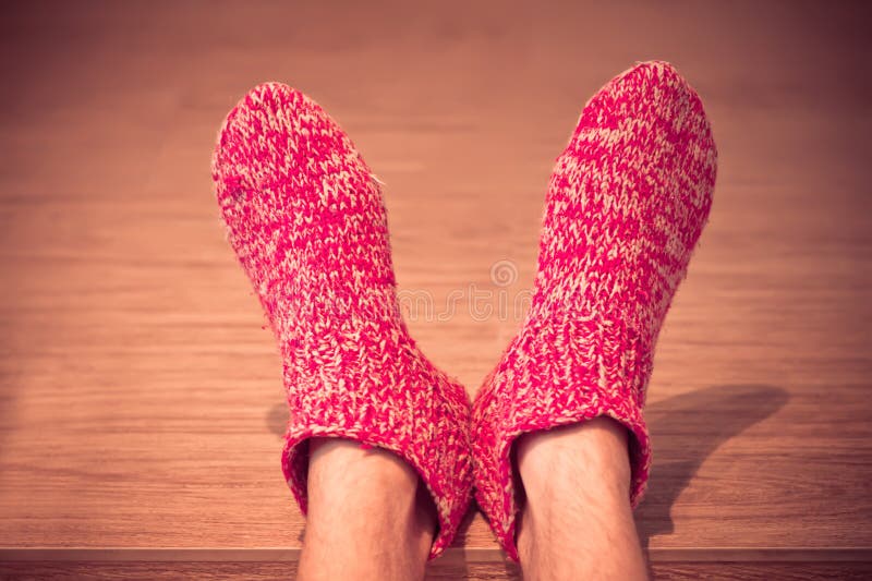Man Legs in red Wool Socks male knitted clothes winter stock photography Man Legs in red Wool Socks male knitted clothes winter stock photography