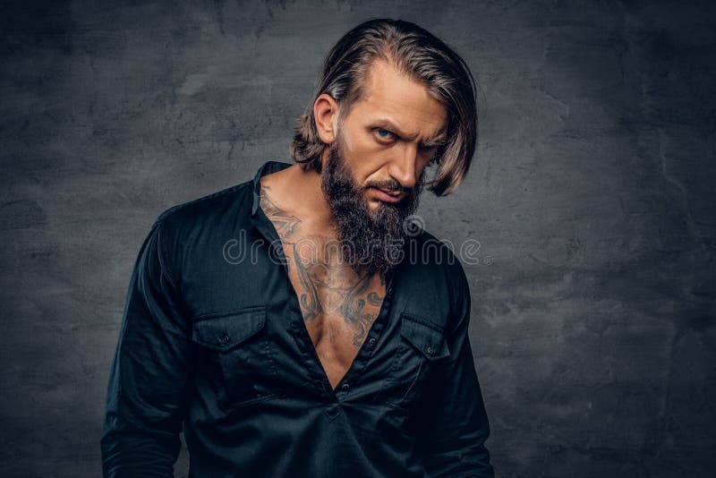 A Man with Long Hair and Tattoos on His Chest Dressed in a Black Stock Image - Image of background, confident: 110051587 A Man with Long Hair and Tattoos on His Chest Dressed in a Black Stock Image - Image of background, confident: 110051587