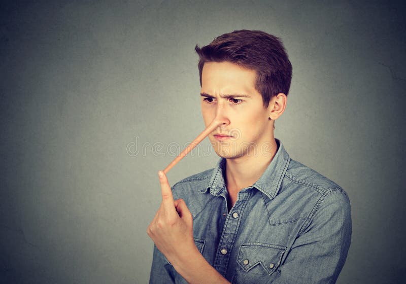 Free Photo  Handsome young male pretending to show something in