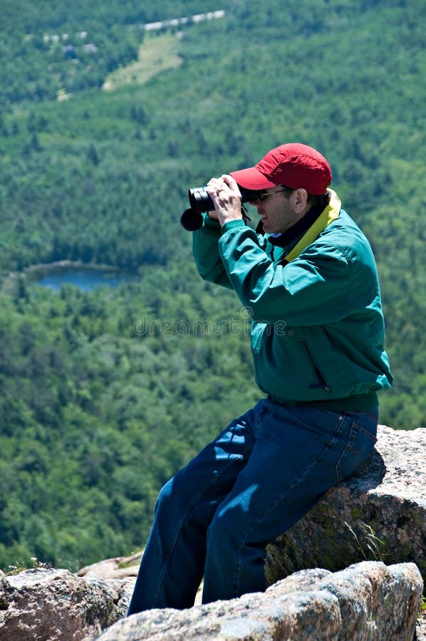 Man Looking Through Binoculars royalty free stock photography