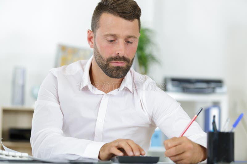Man looking through drafts stock photos