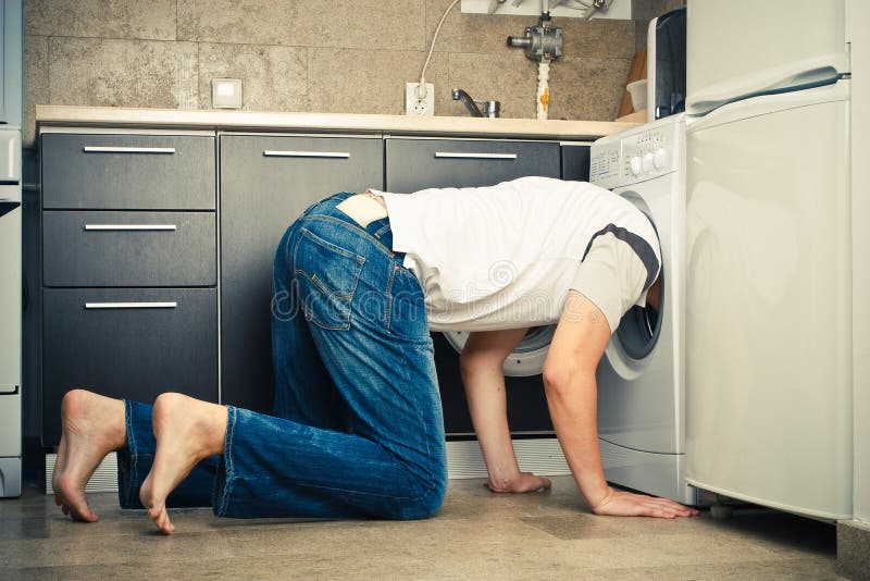 Man Looking Inside the Washing Machine Stock Image Image of life