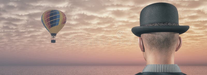 Man looks at hot air balloons