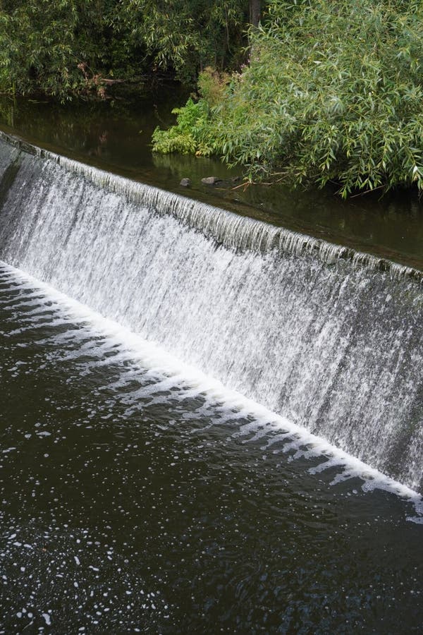 A man made waterfall during summer. Man made waterfall stock images, royalty-free photos and pictures