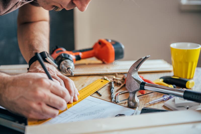 Man Making Draft Plan with Pencil on the Table Stock Photo Image of