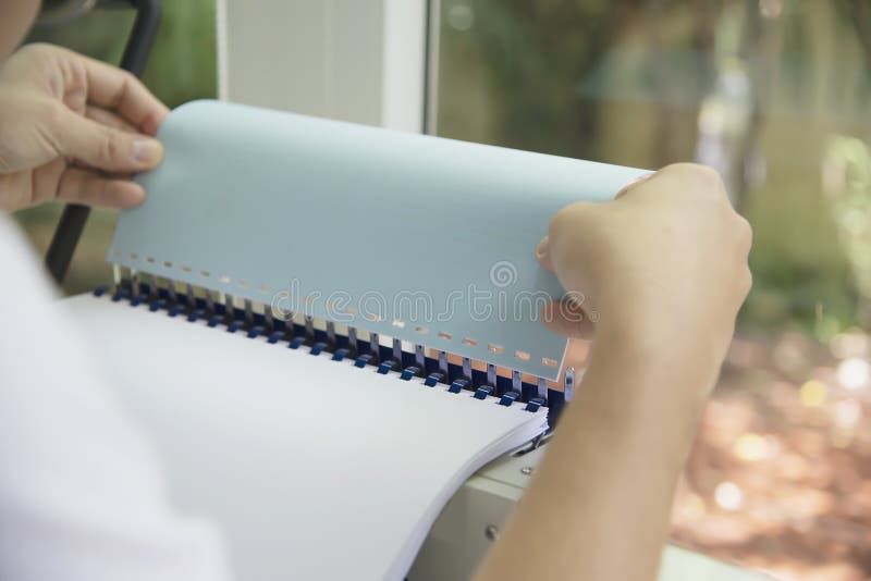 Man Making Report Using Comb Binding Machine Stock Image Image of
