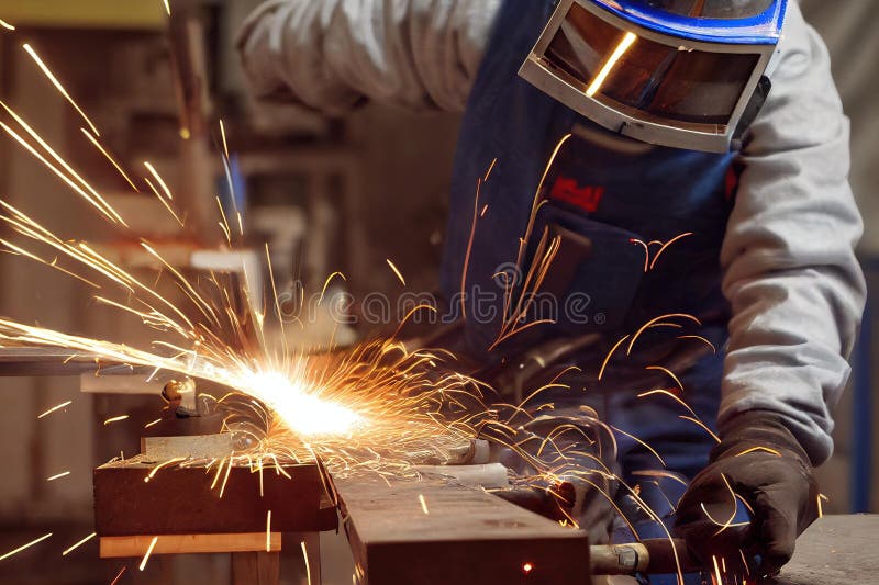 Man in mask bent over machine welding process with steel. stock illustration