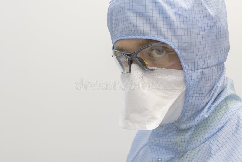 Man with mask gas in the lab. Chemical and virus protection. Man with mask gas in the lab. Coronavirus 2019 - nCoV stock images Man with mask gas in the lab. Chemical and virus protection. Man with mask gas in the lab. Coronavirus 2019 - nCoV stock images
