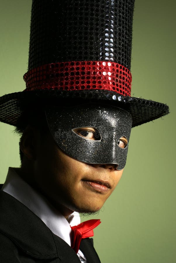 Man in mask and top hat stock photo. Image of malay, asian - 7550728