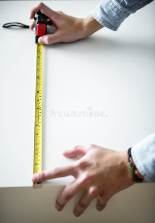 Man Measuring the with Measurement Tape Stock Photo Image of