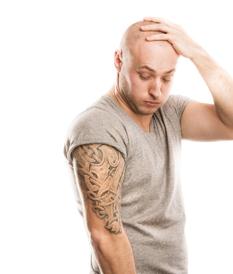 Man med tatueringen royaltyfri fotografi Man med tatueringen royaltyfri fotografi