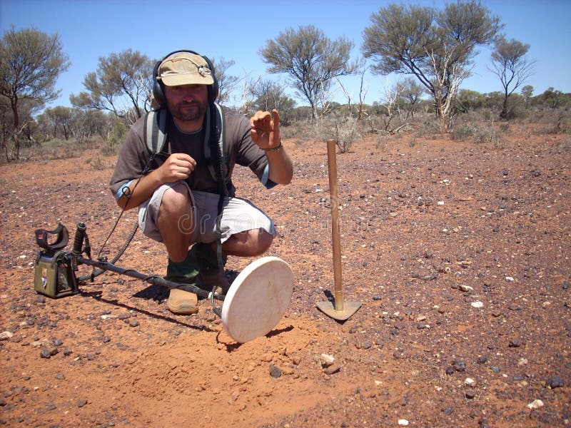 Man,metal detecting royalty free stock photos