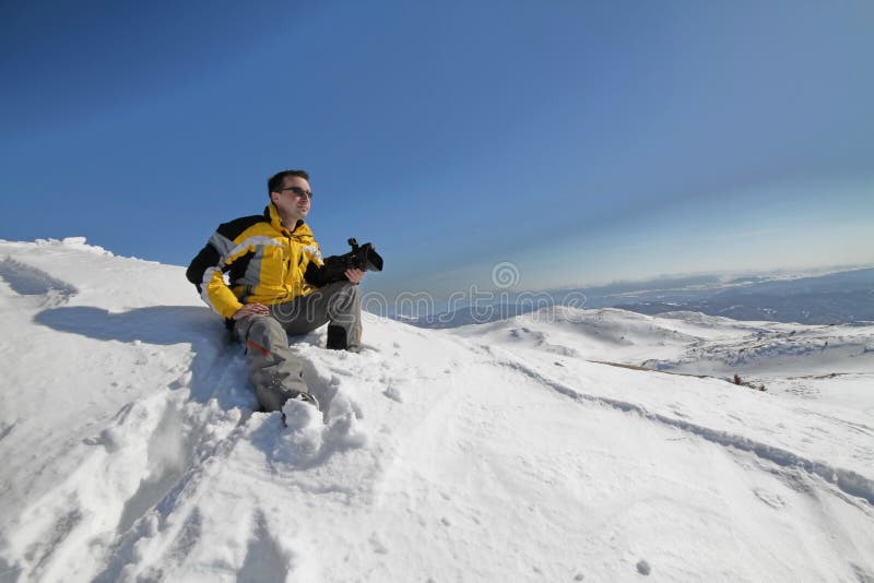 Cameraman on mountain stock photos