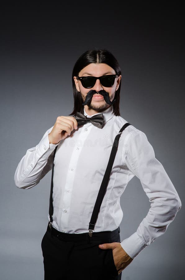 The Man with Moustache and Sunglasses Against Gray Stock Image Image