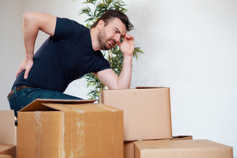Man Feeling Back Ache Cramp Lifting Heavy Boxes Stock Image Image of