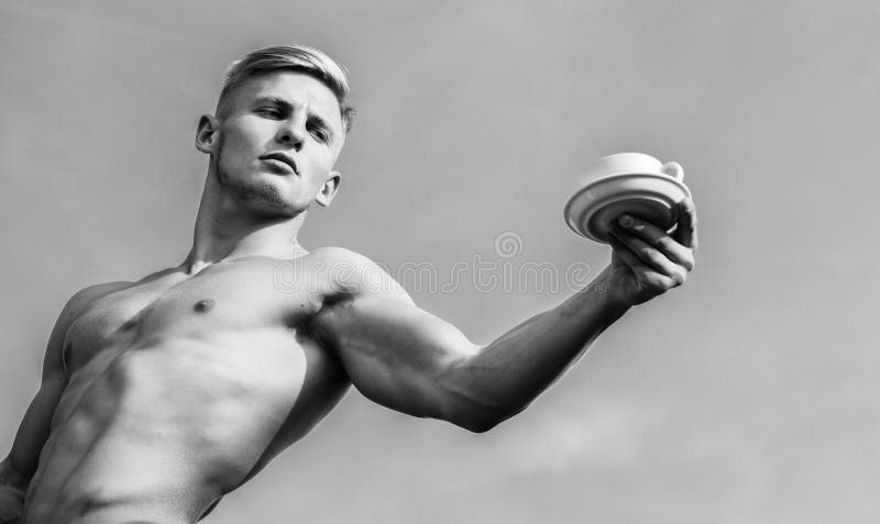 Man Muscular Athlete Bodybuilder Offers You Coffee Waiter Bare Chest Hold Coffee Cup Stock