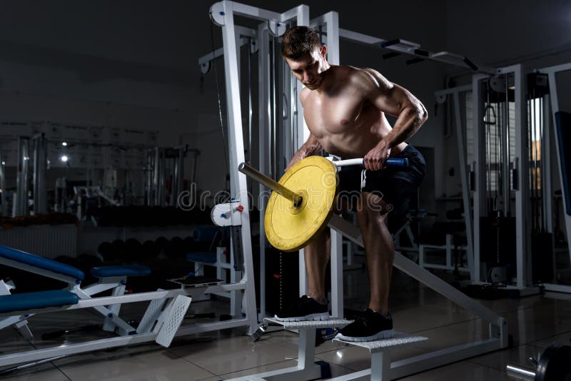 Man with a Naked Torso Doing Deadlift in a Gym Stock Image - Image of