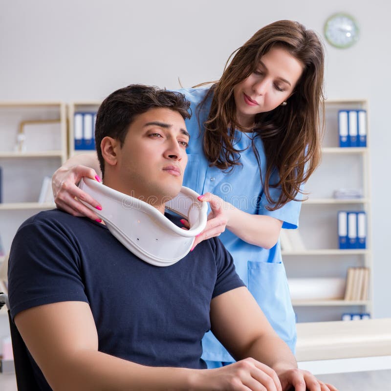 Man with Neck Injury Visiting Doctor for Checkup Stock Photo Image