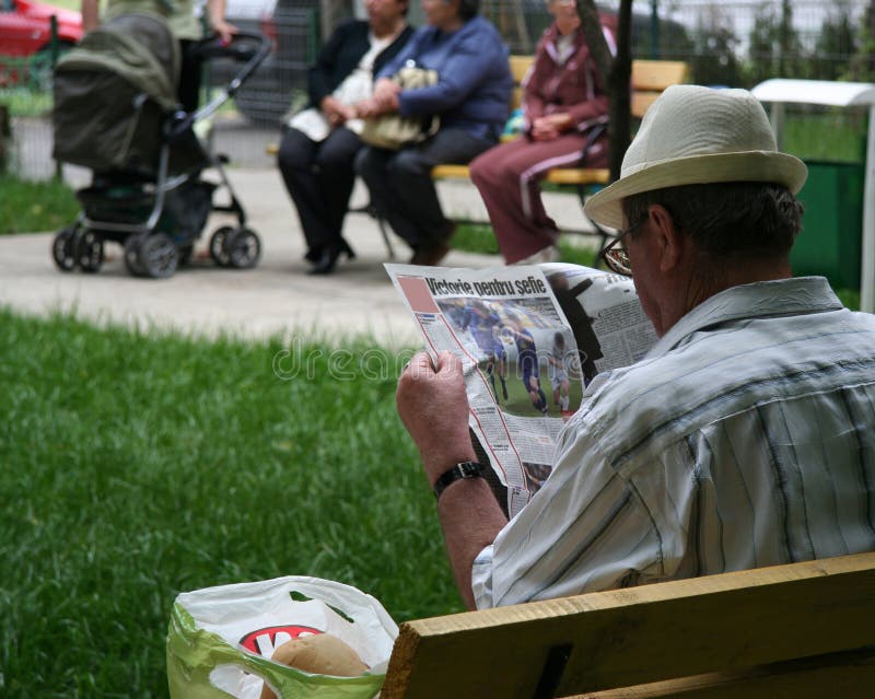 Man with newspaper