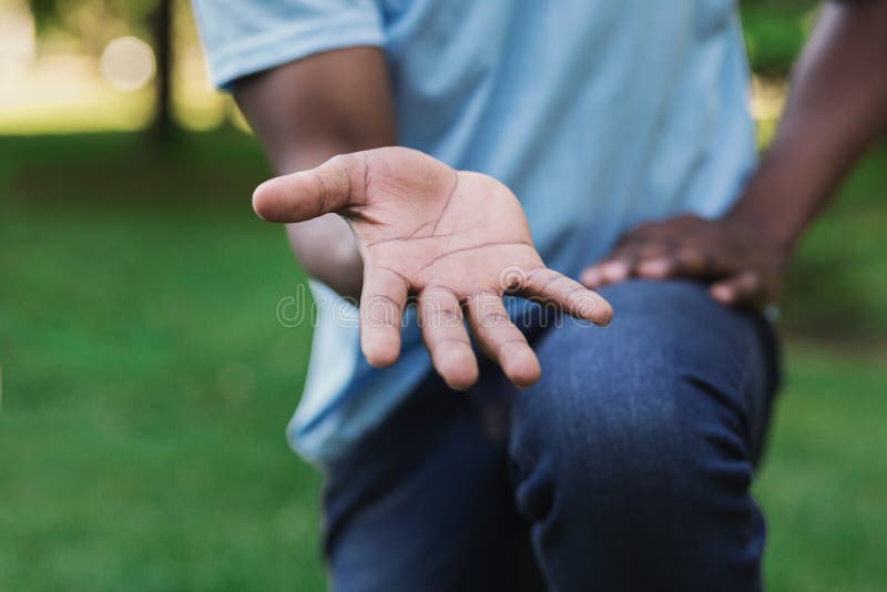 Man offering something in empty hand to camera royalty free stock image Man offering something in empty hand to camera royalty free stock image