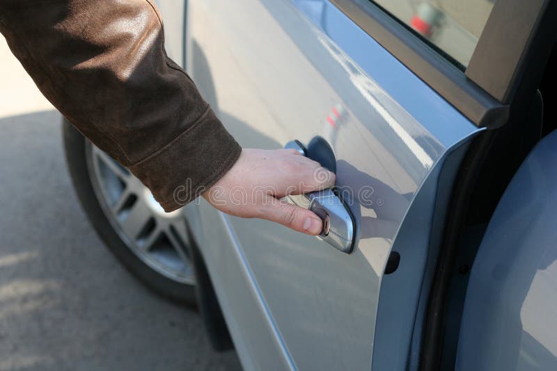 Man is open the door of car