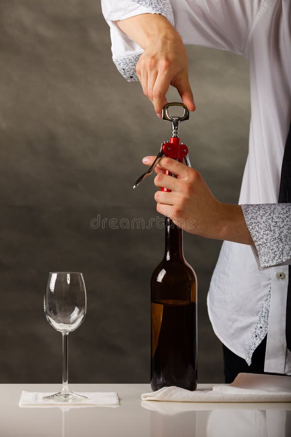 Man Opening Bottle of Wine with Corkscrew Stock Image Image of hands