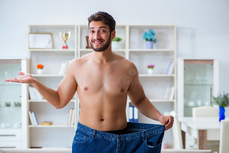 The Man in Oversized Pants in Weight Loss Concept Stock Image Image