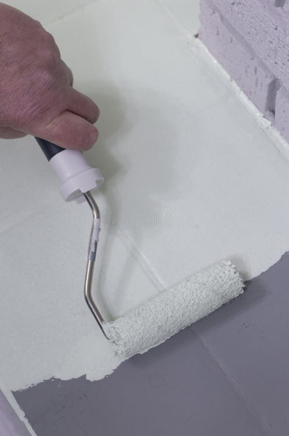 Man Painting Tiles with a Paint Roller. Stock Image Image of coverage, green 240524597