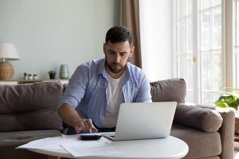 man-pay-taxes-bills-online-using-e-bank-on-laptop-stock-photo-image
