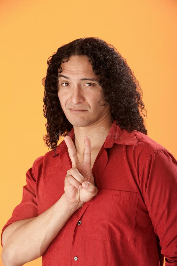Man with Peace Symbol stock photography