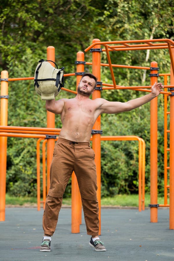 Man Performing Bag Squat Exercise Outdoor Stock Image Image of sport