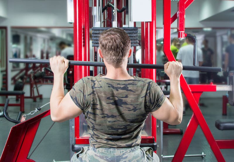 Man Performing Lat Pulldown at the Gym Stock Photo Image of strength, lifestyle 73769322