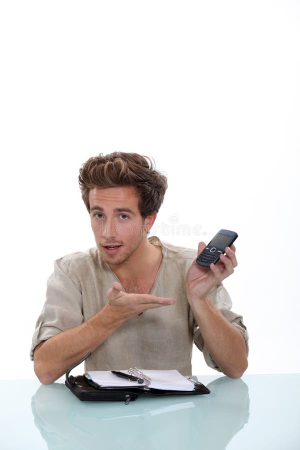 Man with a personal organizer stock image